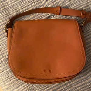 FEED saddle bag purse